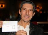 Peter shows off the winning card design for Project Edan in 2009. Photo by B. Shihara, used with permission.